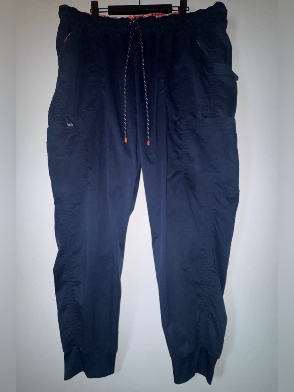 koi Navy Cargo Drawstring Scrub Jogger Pants with Orange Accents